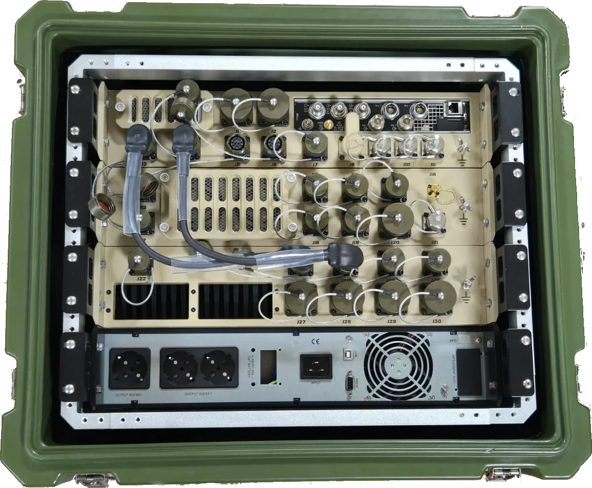Top view of a 6L Systems rack in a green transport case, with connector panels and a power unit