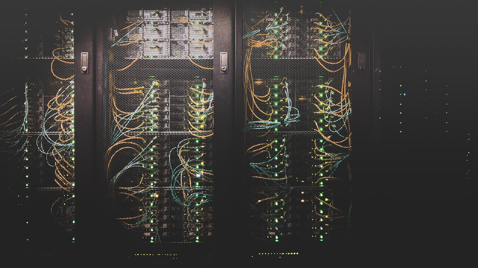 Dark server racks with network cabling in a data center